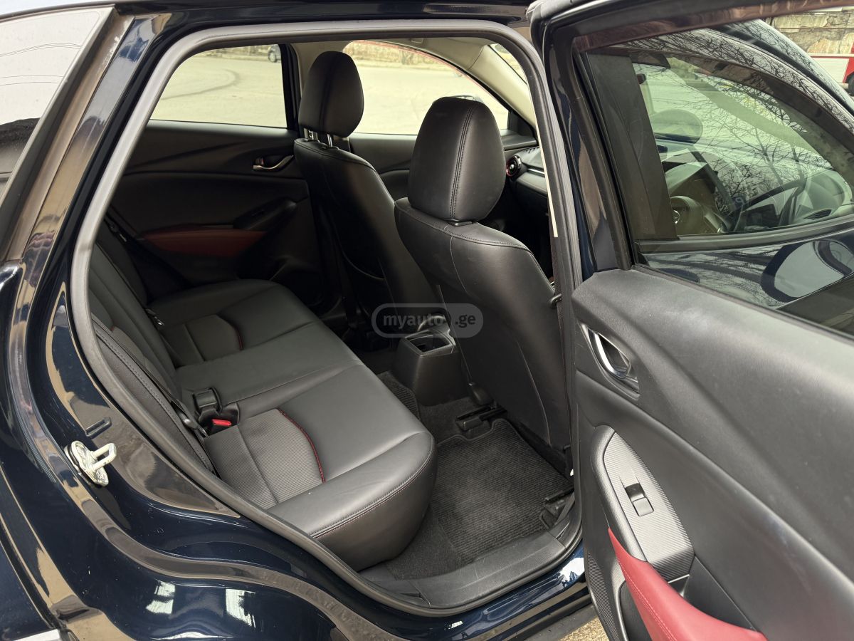 Mazda CX-3 - фото 12