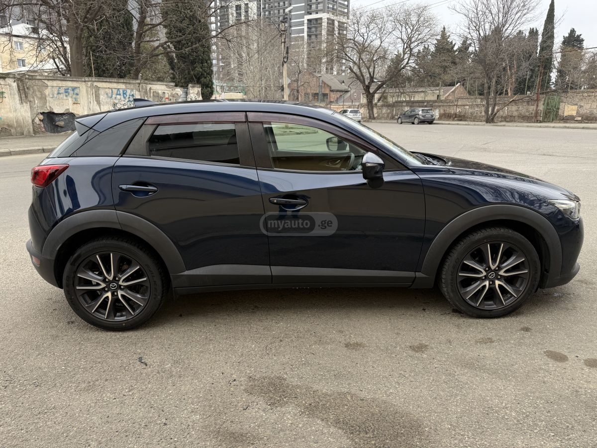 Mazda CX-3 - фото 7