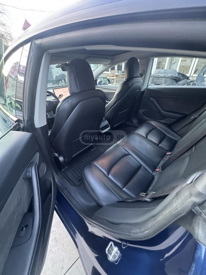 Tesla Model 3 - фото 6