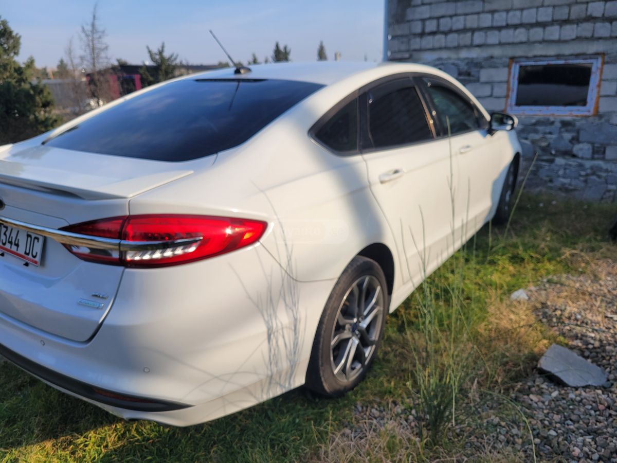 Ford Fusion - фото 11