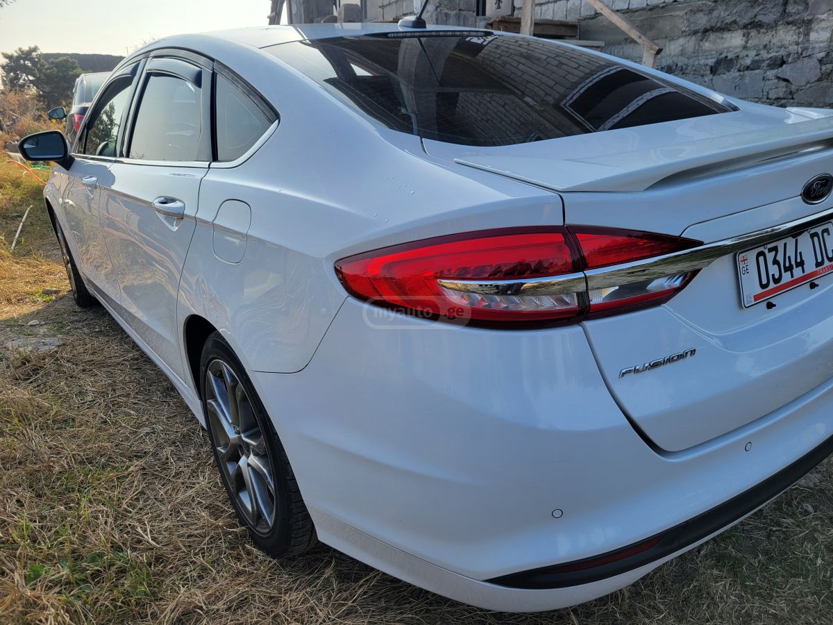 Ford Fusion - фото 14