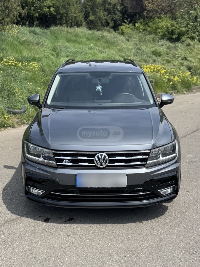 Volkswagen Tiguan - фото 1