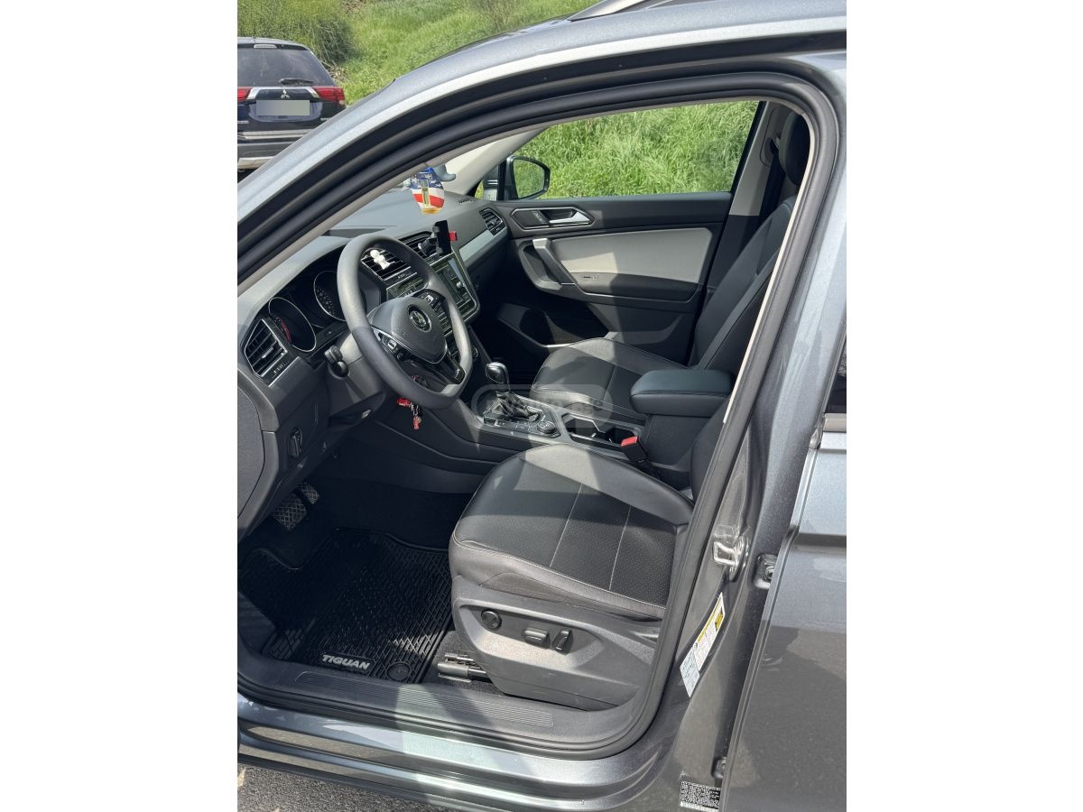 Volkswagen Tiguan - фото 11