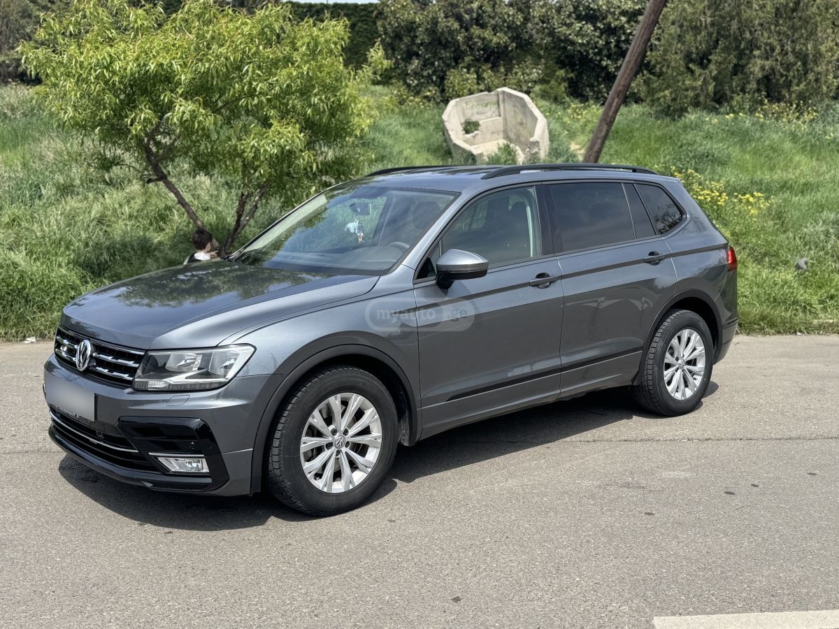Volkswagen Tiguan - фото 9