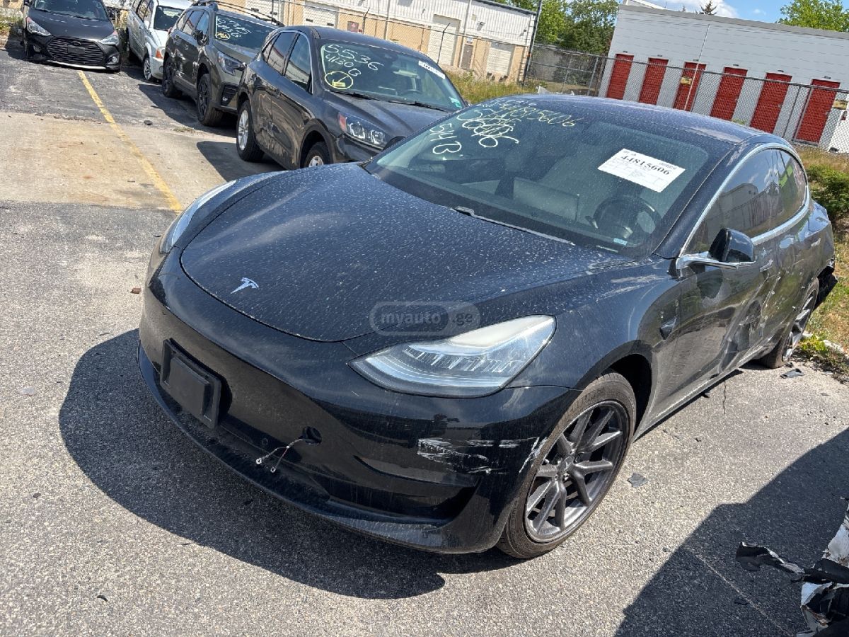 Tesla Model 3 - фото 1