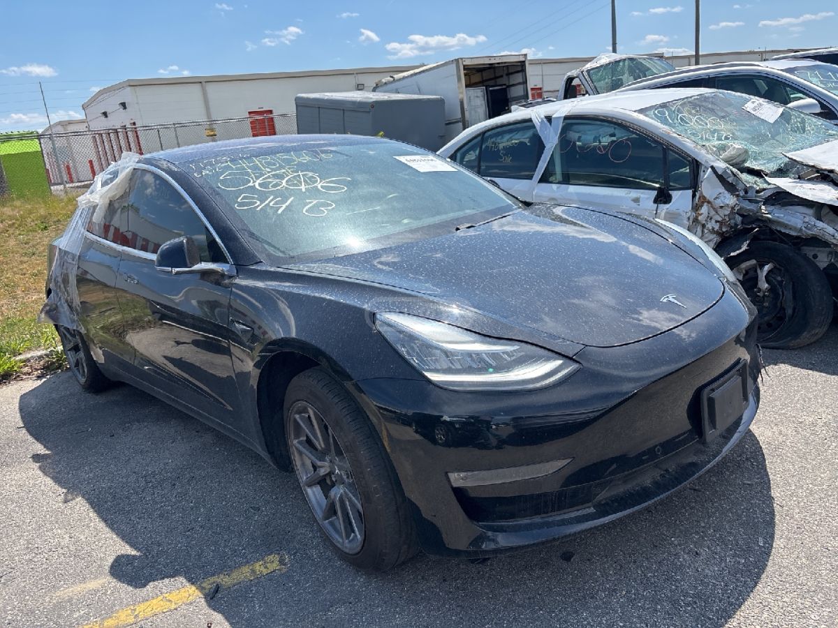 Tesla Model 3 - фото 2