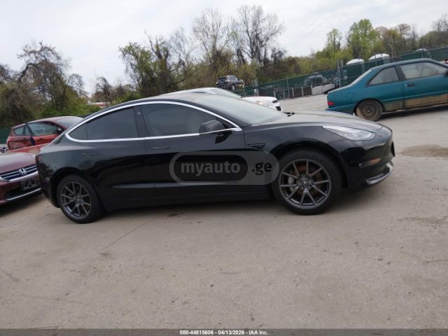 Tesla Model 3 - фото 7