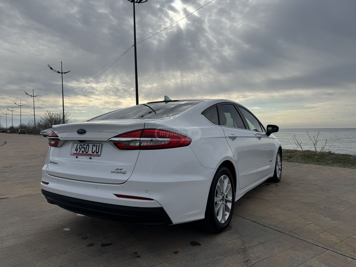 Ford Fusion - фото 6