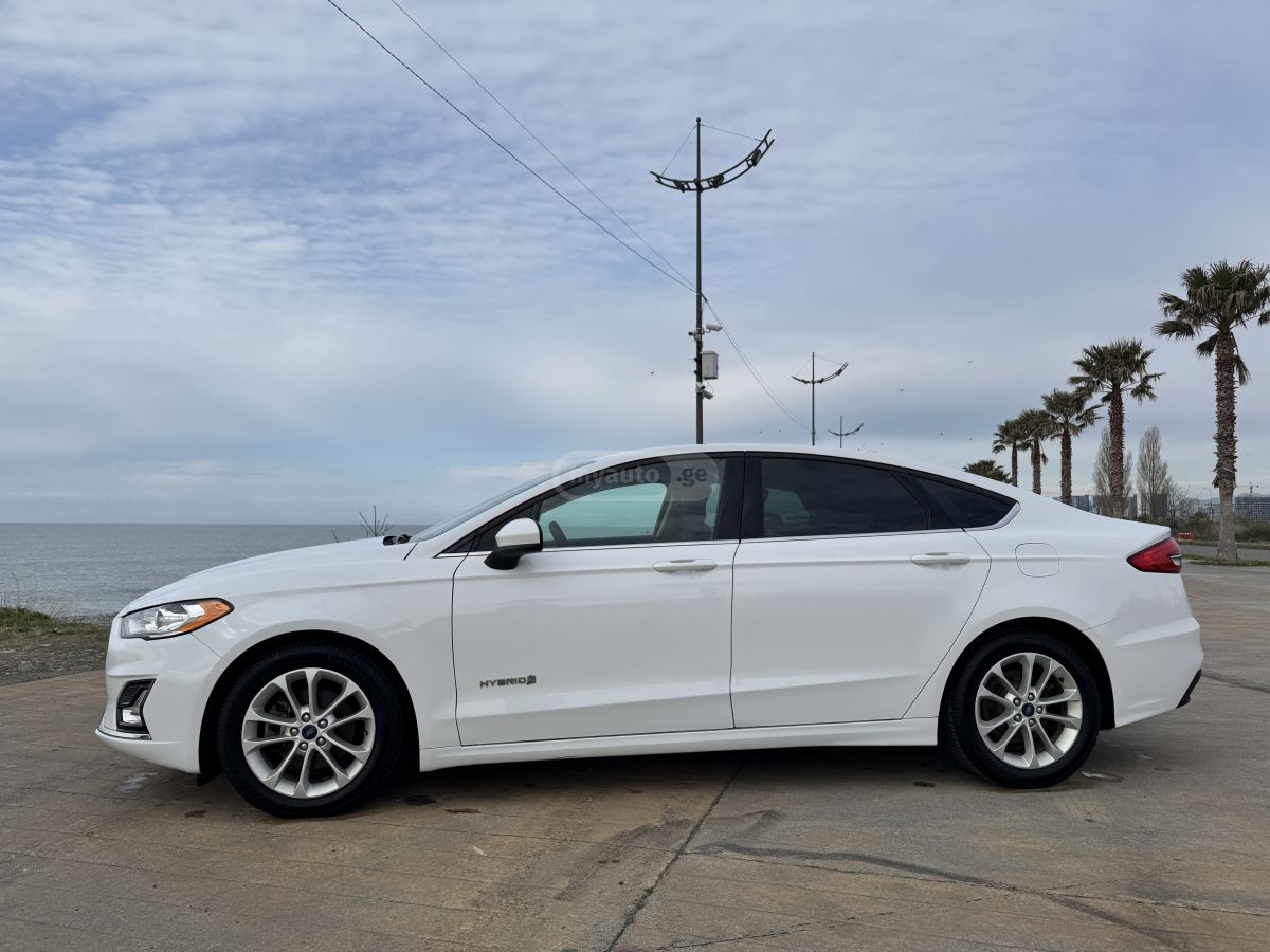 Ford Fusion - фото 8