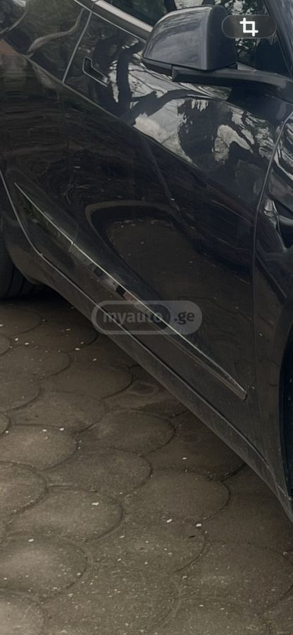 Tesla Model 3 - фото 8