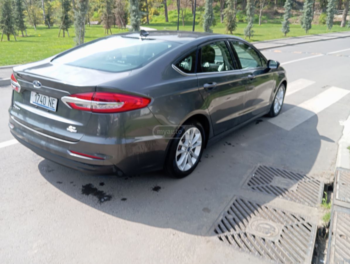 Ford Fusion - фото 7