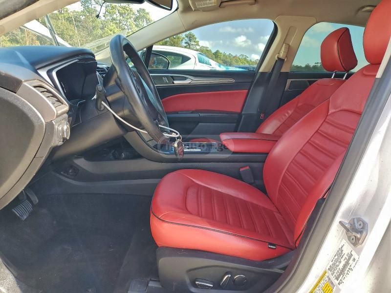 Ford Fusion - фото 7