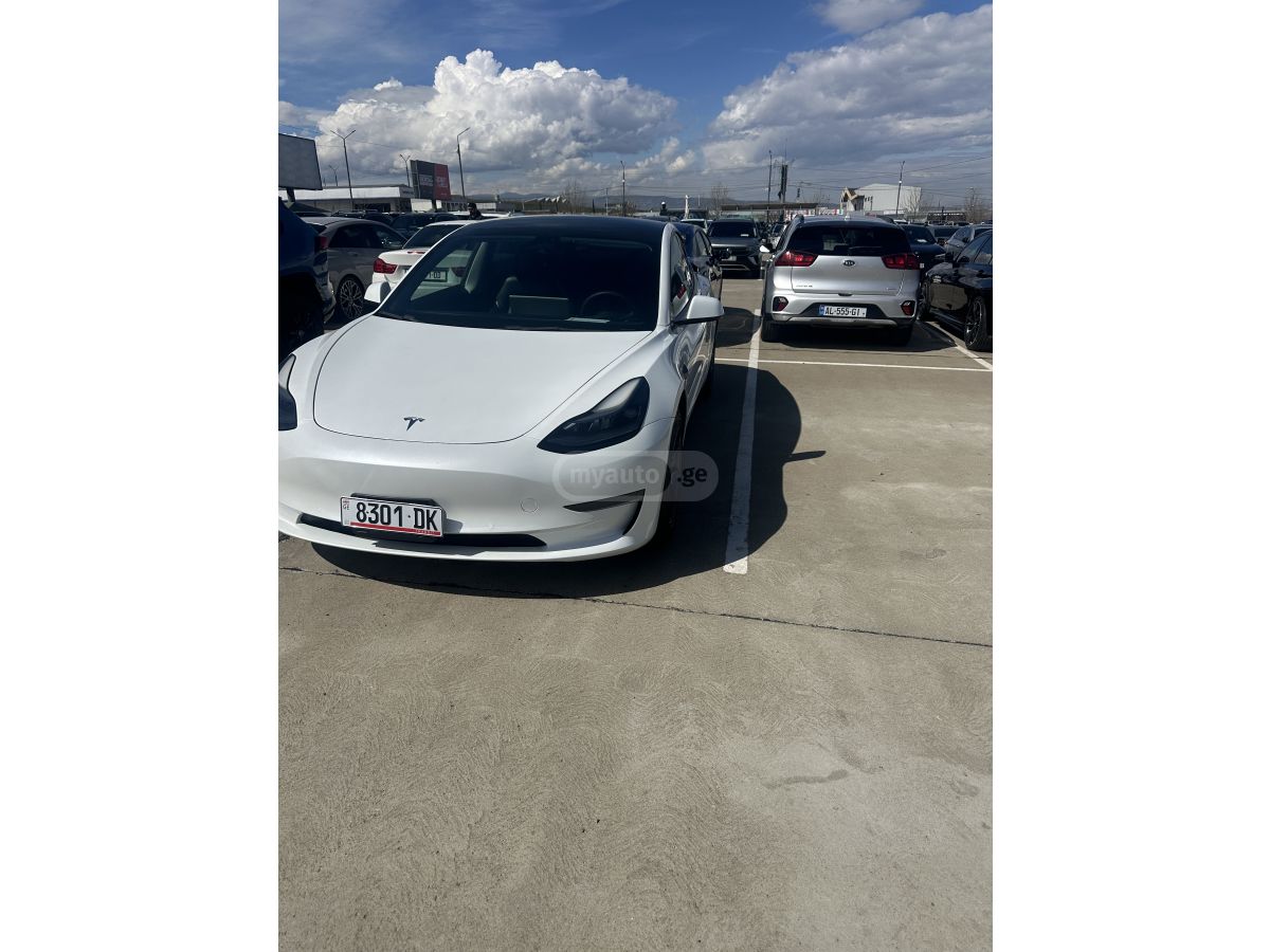 Tesla Model 3 - фото 7