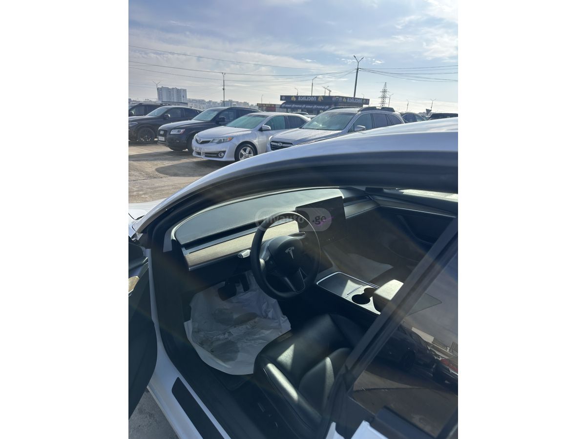 Tesla Model 3 - фото 9