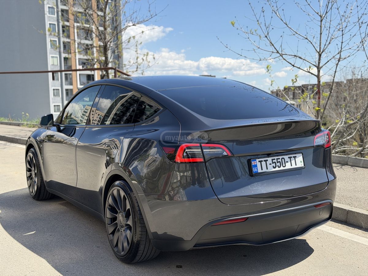 Tesla Model Y 2024 — фото 6 купить в Москве