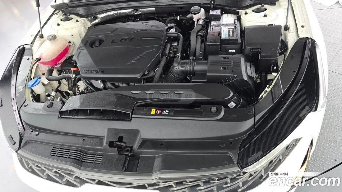 Kia Optima - фото 6