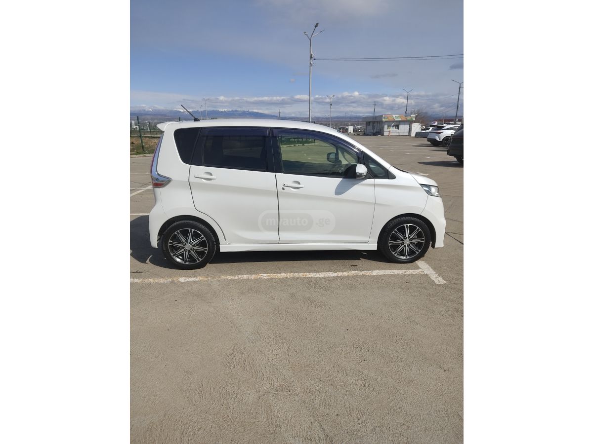 Mitsubishi EK Wagon - фото 7