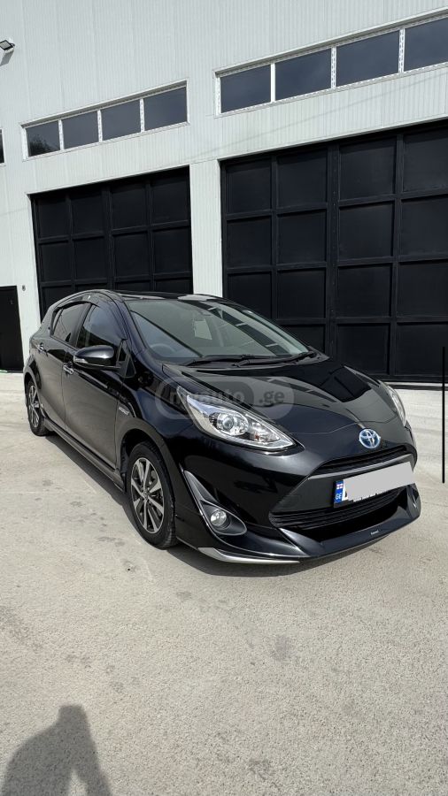 Toyota Aqua - фото 1