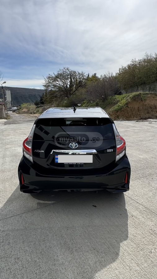 Toyota Aqua - фото 6