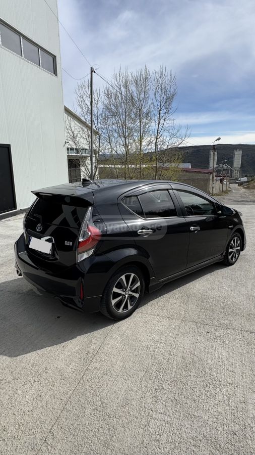 Toyota Aqua - фото 7