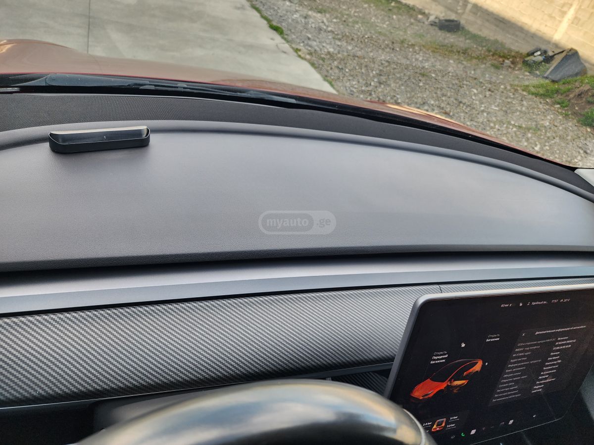 Tesla Model Y - фото 11