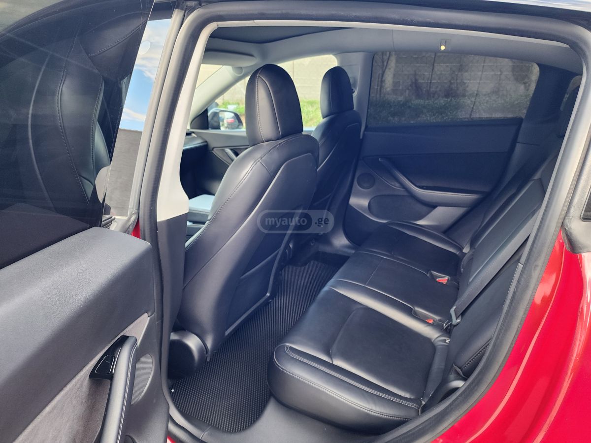 Tesla Model Y - фото 7