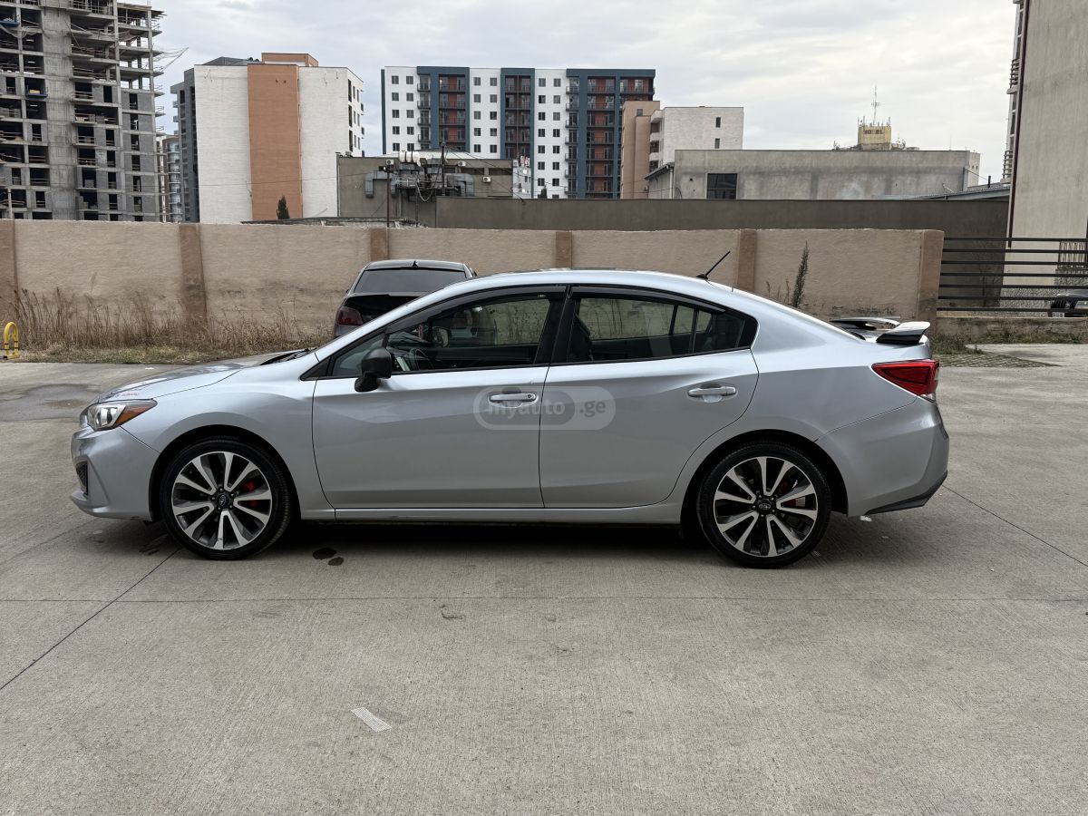 Subaru Impreza - фото 7