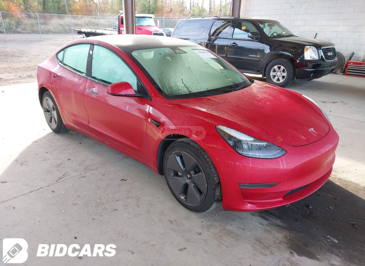 Tesla Model 3 - фото 1