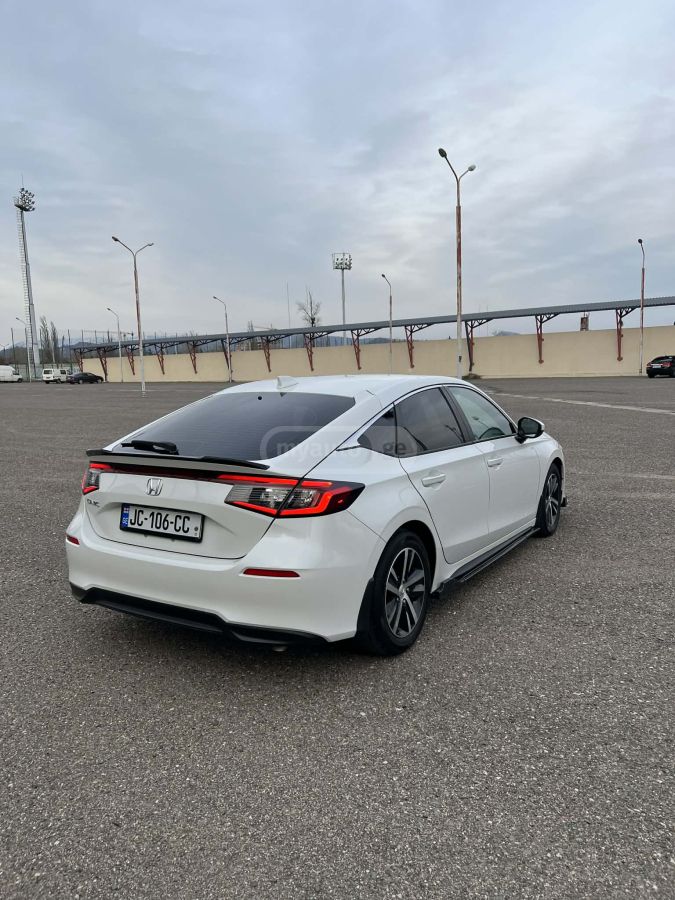 Honda LX 4dr Hatchback CVT — миниатюра 6