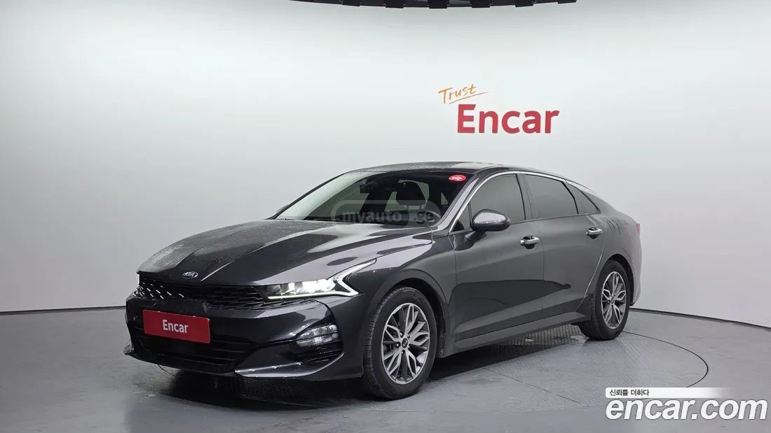 Kia Optima - фото 1