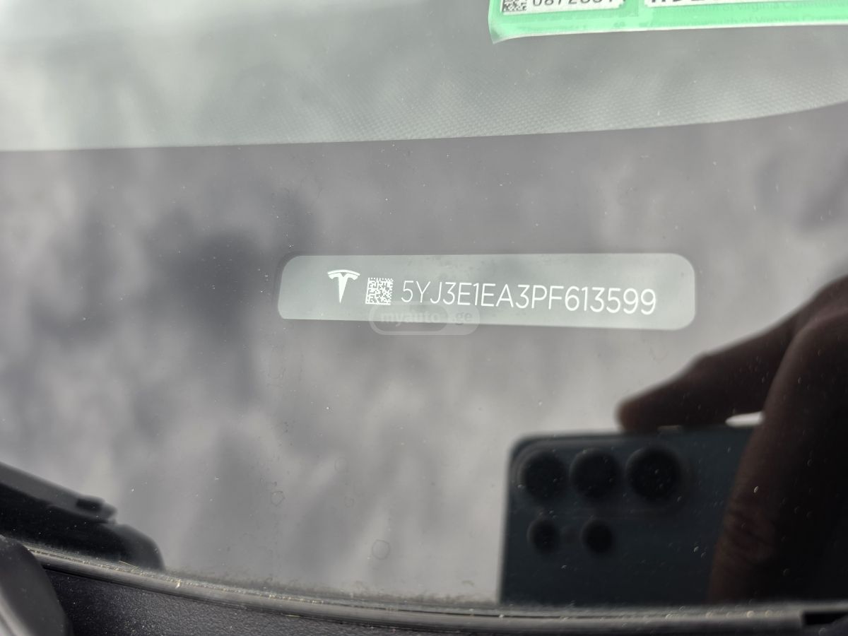 Tesla Model 3 - фото 11