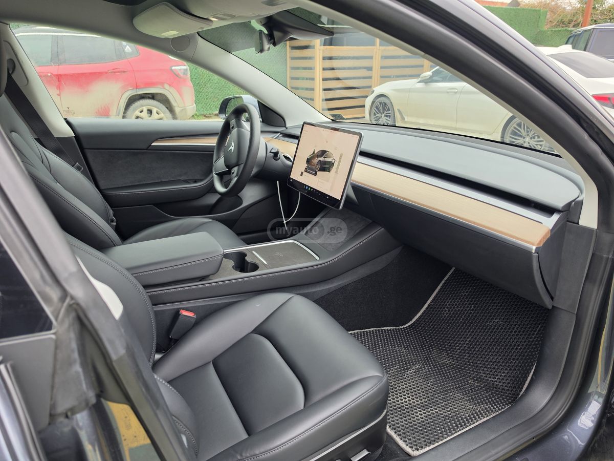 Tesla Model 3 - фото 6