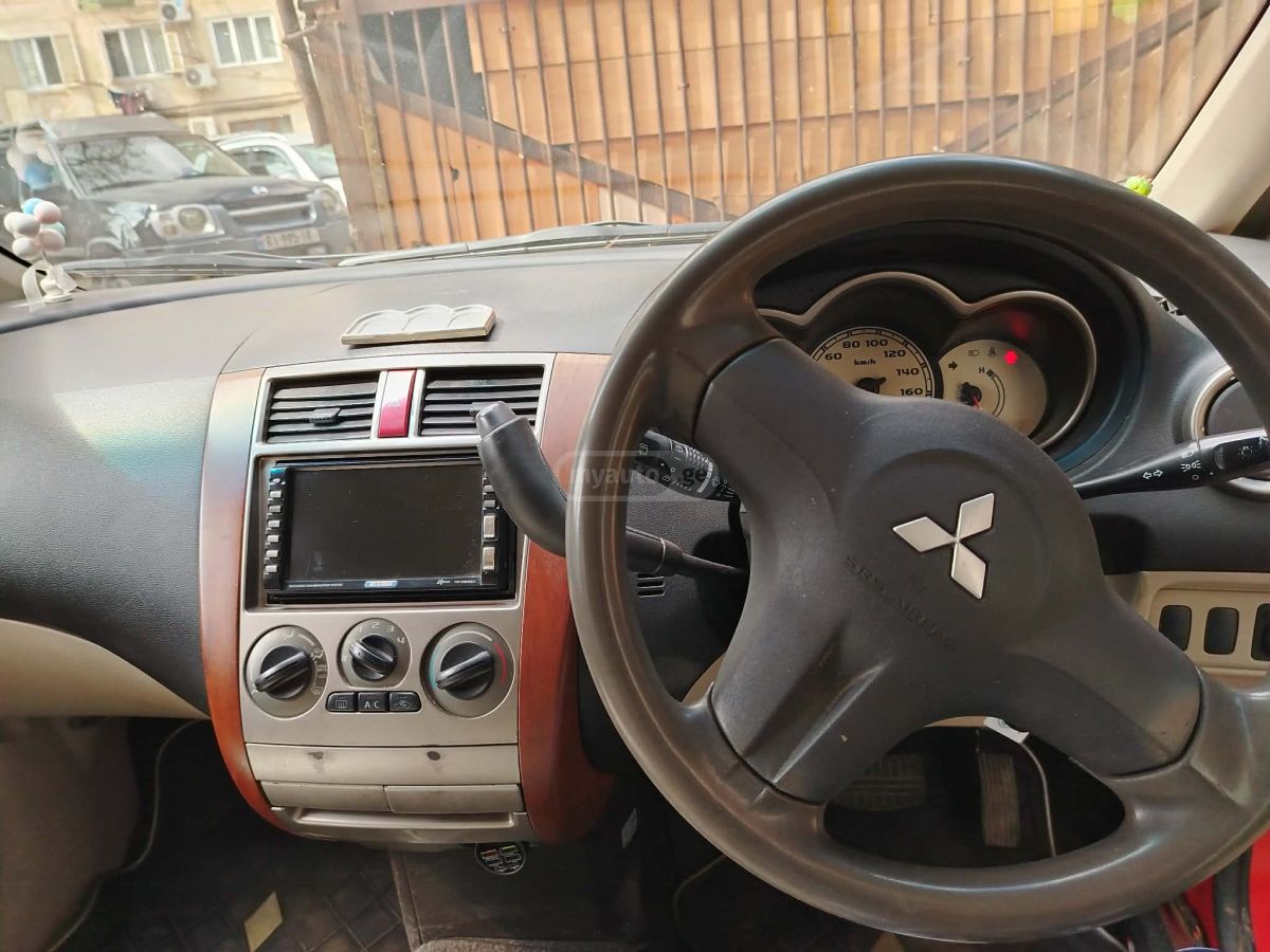 Mitsubishi Colt - фото 5