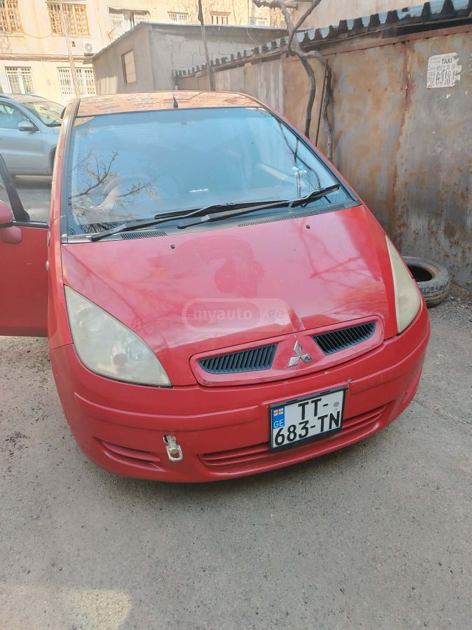 Mitsubishi Colt - фото 8