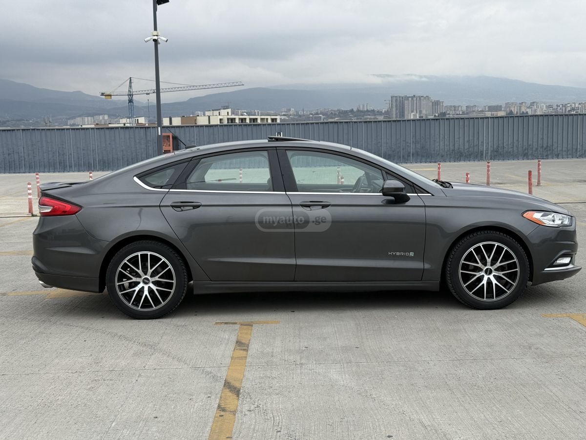 Ford Fusion - фото 7