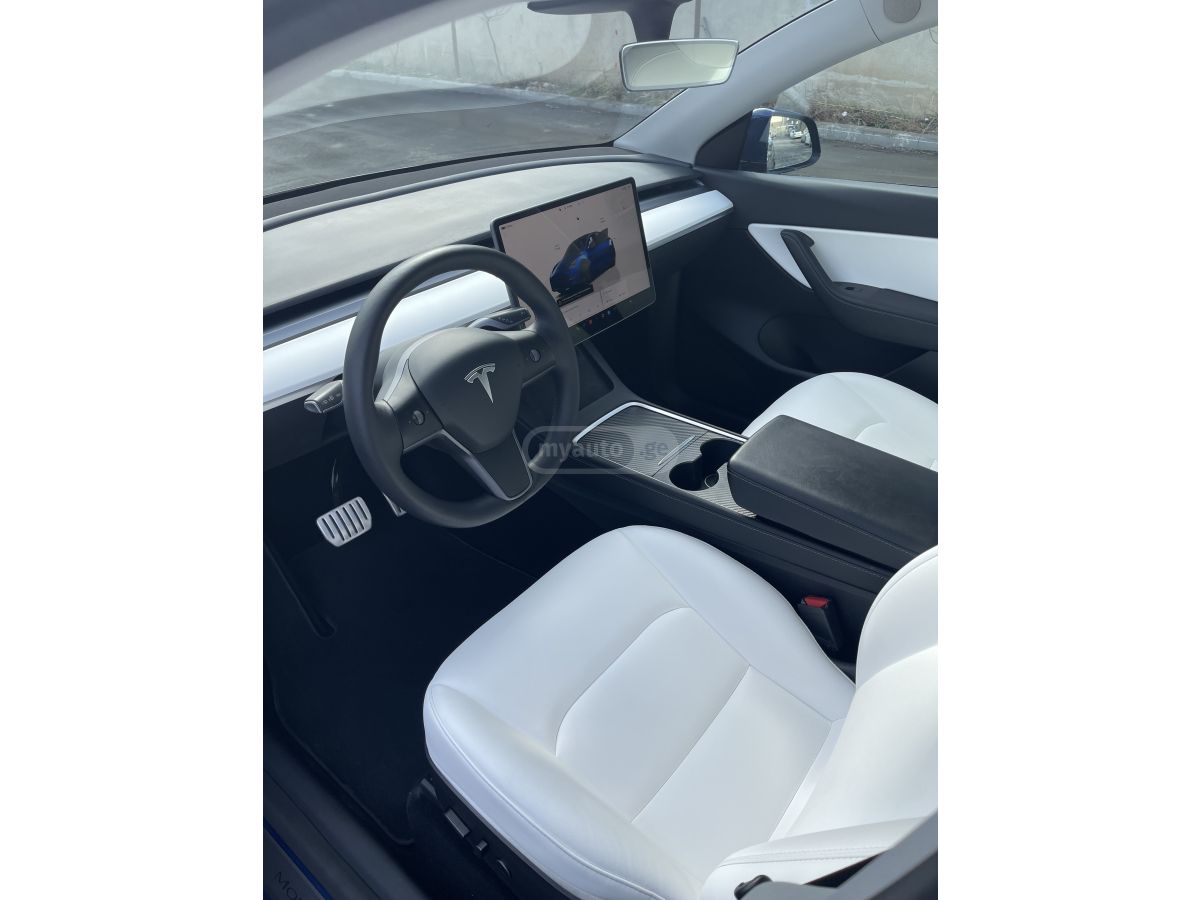Tesla Model Y - фото 7