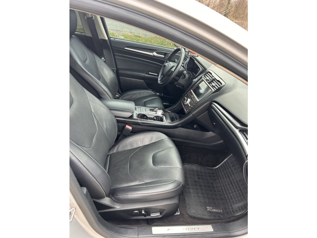 Ford Fusion - фото 7