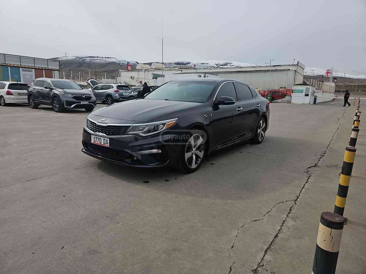 Kia Optima - фото 1