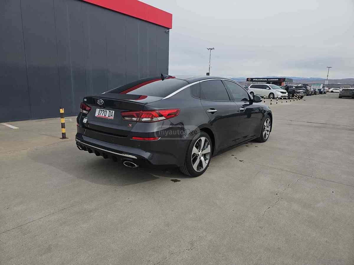 Kia Optima - фото 4