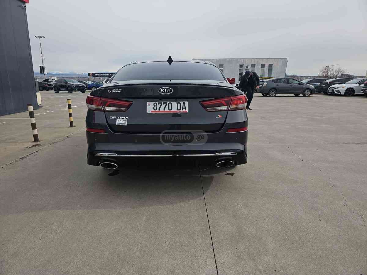 Kia Optima - фото 5