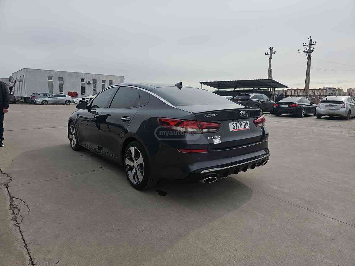 Kia Optima - фото 6