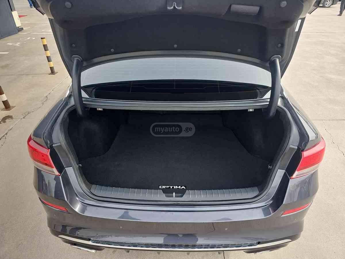 Kia Optima - фото 7