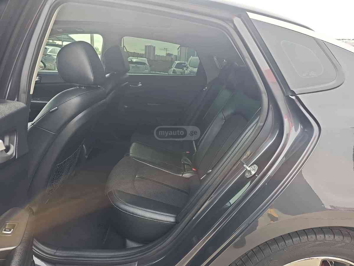 Kia Optima - фото 8