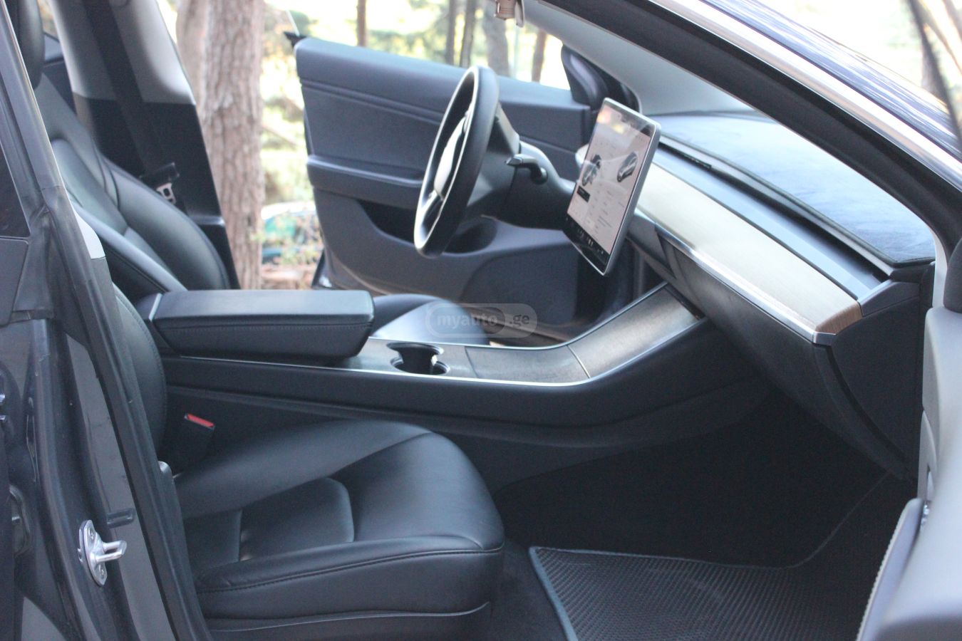 Tesla Model 3 - фото 13