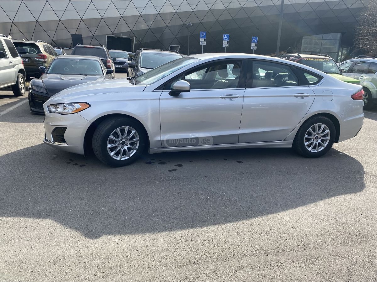 Ford Fusion - фото 10