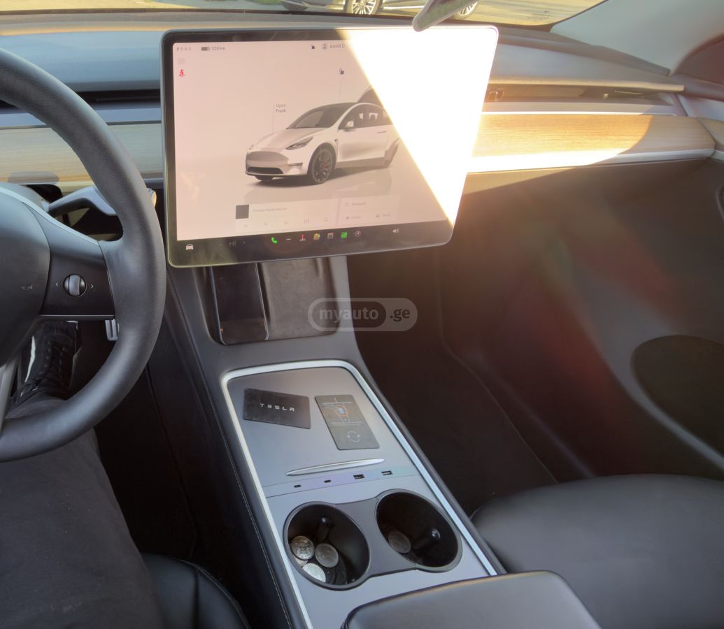 Tesla Model Y - фото 9