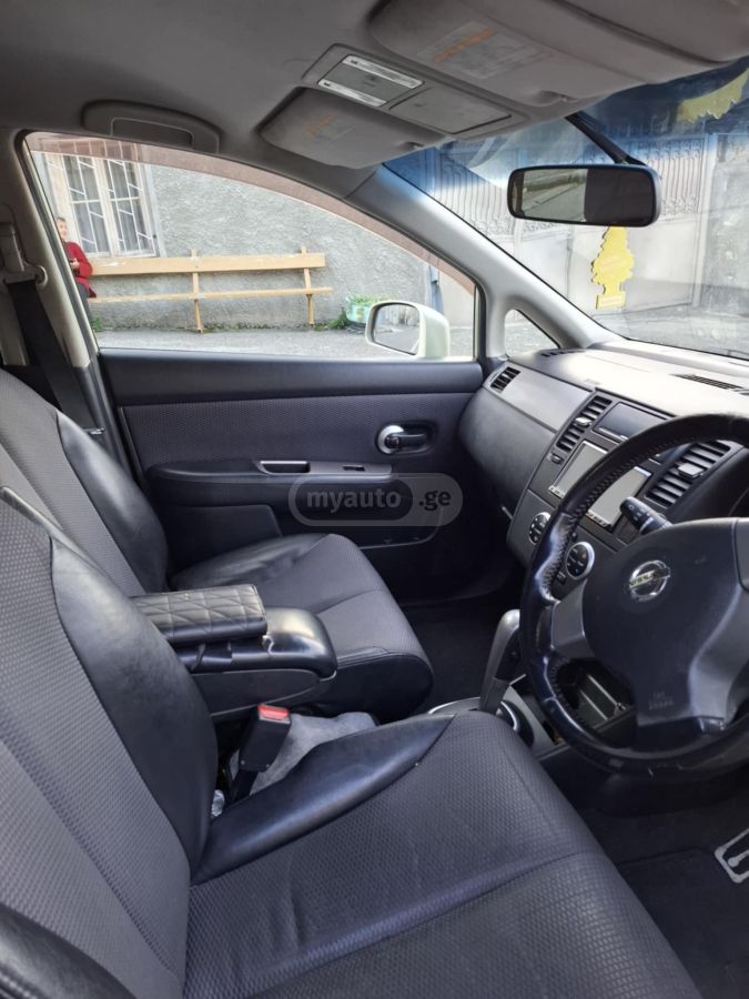 Nissan Tiida - фото 5