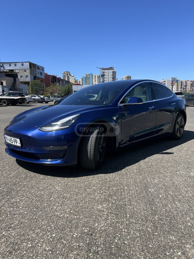 Tesla Model 3 - фото 11