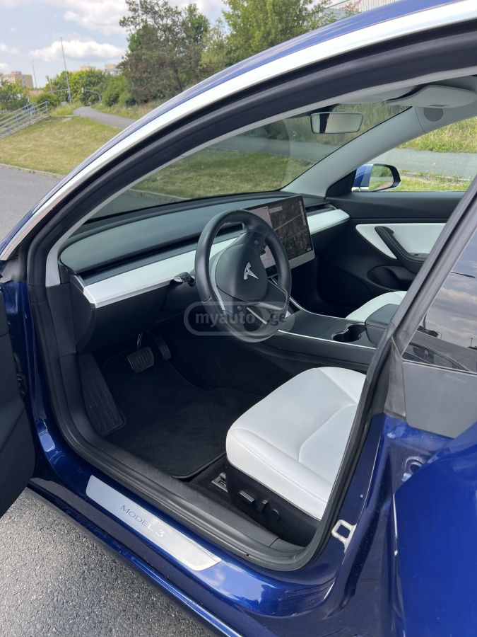 Tesla Model 3 - фото 12