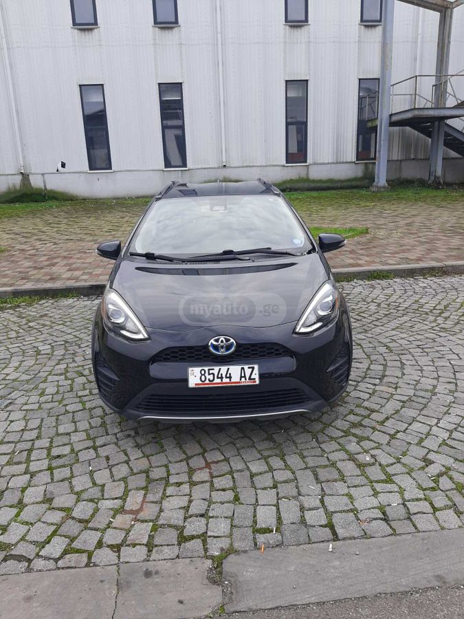 Toyota Prius C - фото 1